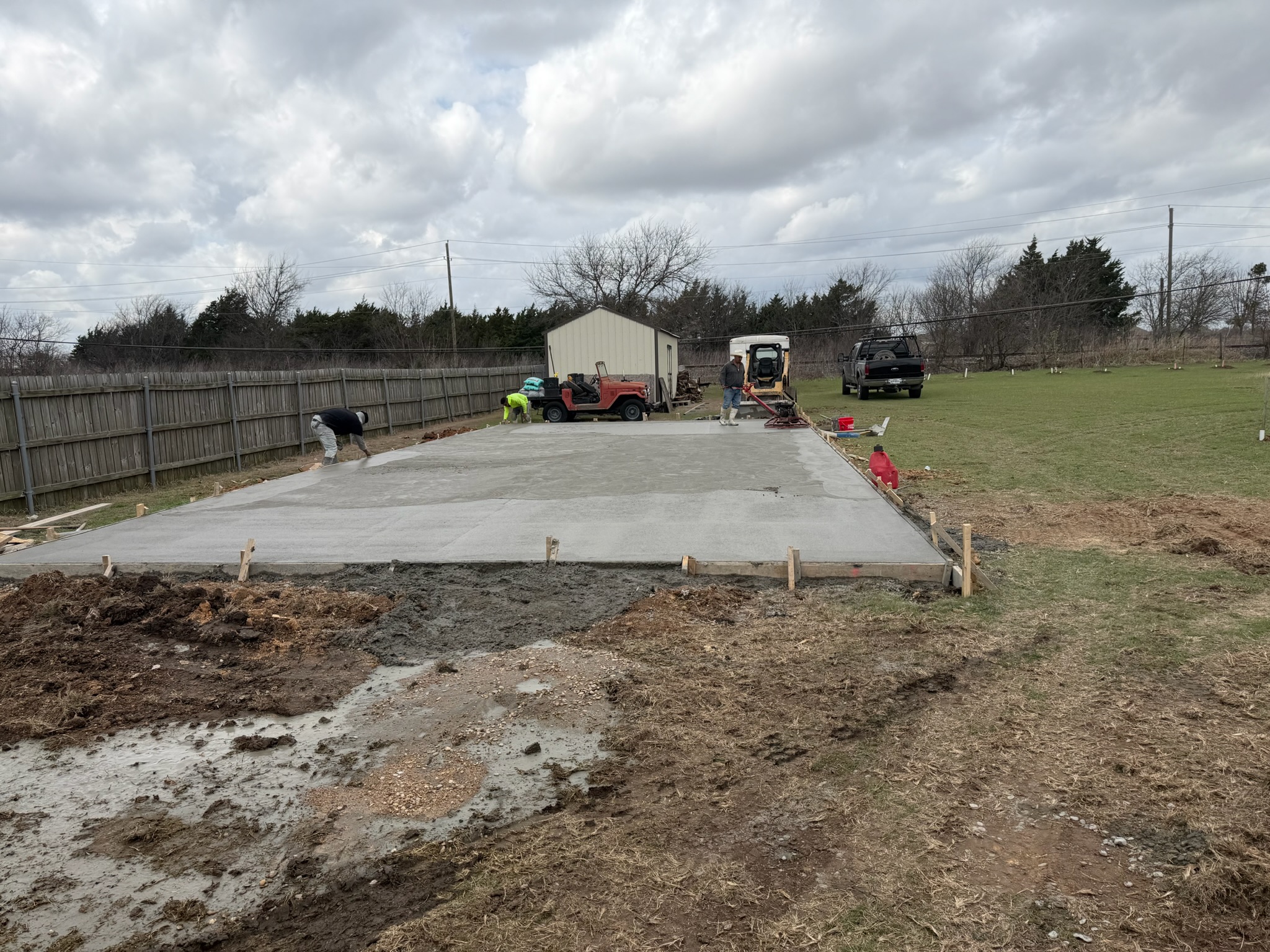 Power-trowel finishing on the unidentified Hewitt concrete slab