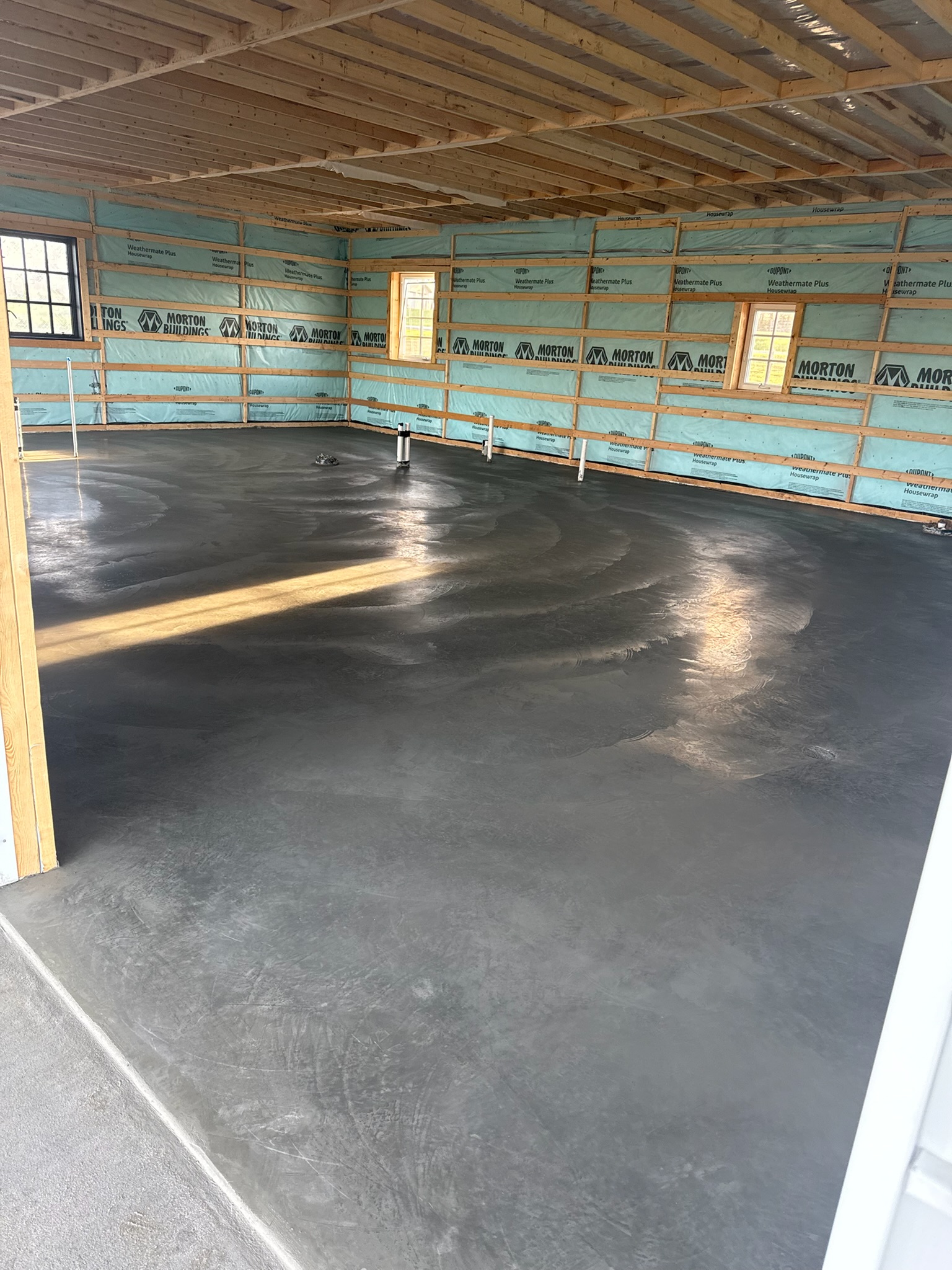 Final trowel-pass pattern on the Chappell Hill interior slab