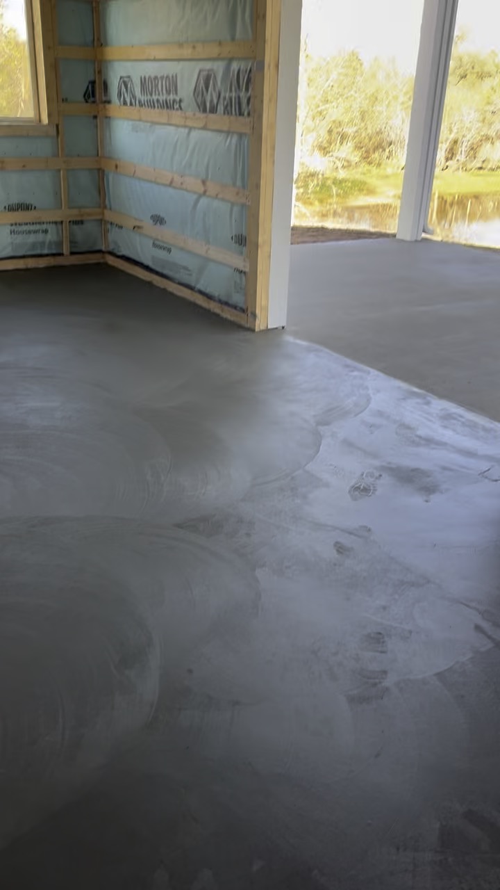 Finished interior and covered exterior concrete at the Chappell Hill barndominium